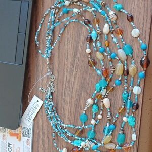 Beaded necklace. NWT. 7 strands, 10"-23" drop
